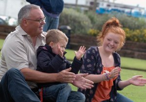 family-enjoying-our-big-gig